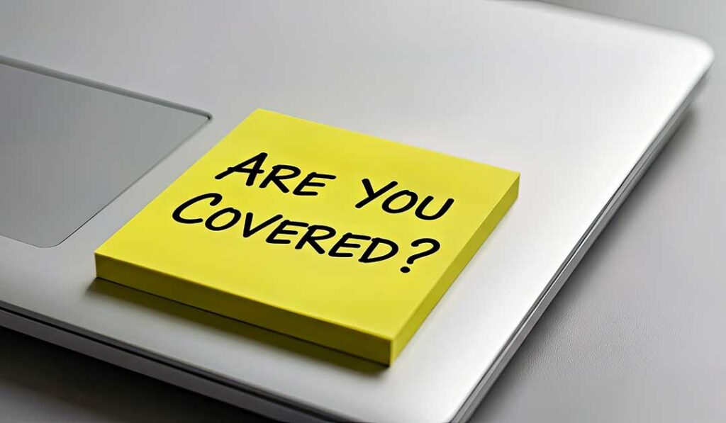 A homeowner reviews a cancellation notice, payment receipt, and insurance documents at a kitchen table.